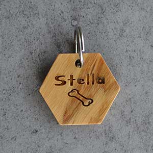 Stella - Medaglia esagonale in legno d'ulivo